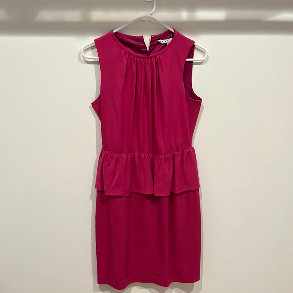 Trina Turk peplum dress in magenta, size 6. Good condition.